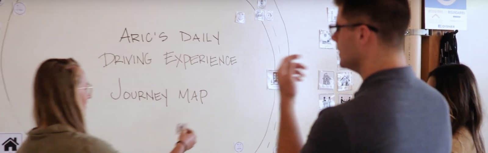 Engineers working on a journey map